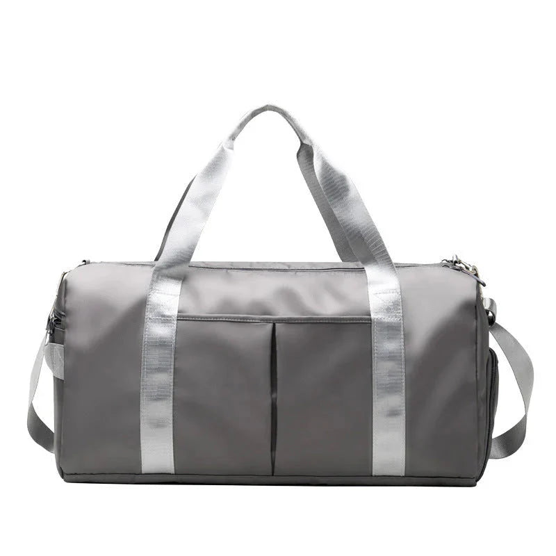 Waterproof Fitness Sports Travel Duffel Bag in sleek gray design with silver straps and pockets.