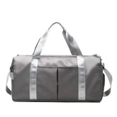 Waterproof Fitness Sports Travel Duffel Bag in sleek gray design with silver straps and pockets.