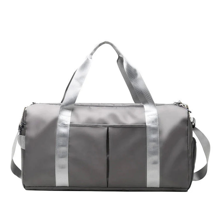 Waterproof Fitness Sports Travel Duffel Bag in sleek gray design with silver straps and pockets.