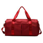 Waterproof Fitness Sports Travel Duffel Bag in vibrant red color with spacious compartments and durable straps.