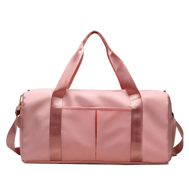 Waterproof Fitness Sports Travel Duffel Bag in pink color, featuring durable straps and spacious storage.