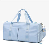 Waterproof Fitness Sports Travel Duffel Bag in light blue color with spacious design and sturdy handles.