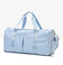 Waterproof Fitness Sports Travel Duffel Bag in light blue color with spacious design and sturdy handles.