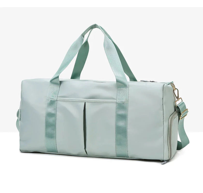 Waterproof Fitness Sports Travel Duffel Bag in light green with dual handles and compartments for optimal storage.