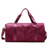 Waterproof Fitness Sports Travel Duffel Bag in burgundy, ideal for gym and weekend adventures.